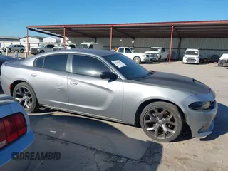 2015 Dodge Charger SXT with VIN 2C3CDXHG8FH884080, listed as a IAAI auction lot 42230385 with 151,948 mi miles and . Bid and sale history available at DreamBid. Image 13.