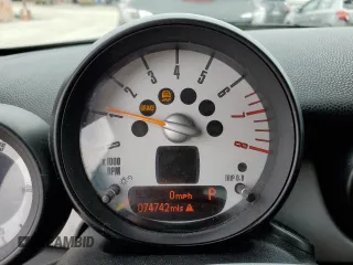 2014 MINI Convertible z VIN WMWZN3C57ET570016, wystawiony jako Copart lot #54565815 z przebiegiem 74 742 mil mil oraz Szkoda całkowita • Salvage title. Historia ofert i sprzedaży dostępna na DreamBid. Obrazek 9.