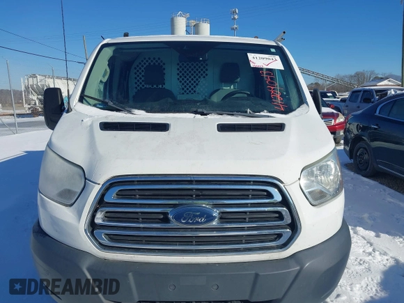 2016 Ford Transit Cargo with VIN 1FTYR1ZM6GKA70265, listed as a IAAI auction lot 41209043 with 156,112 mi miles and . Bid and sale history available at DreamBid. Image 6.