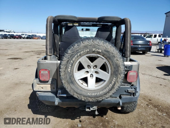 2006 Jeep Wrangler Rubicon with VIN 1J4FA69S36P744801, listed as a Copart auction lot 46541575 with 164,347 mi miles and Salvage title. Bid and sale history available at DreamBid. Image 6.