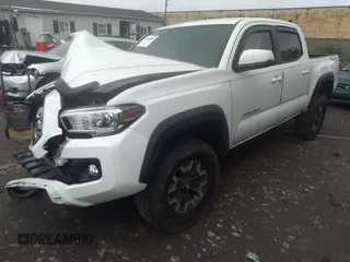 2017 Toyota Tacoma SR5 with VIN 3TMCZ5AN0HM099549, listed as a IAAI auction lot 33153884 with 58,517 mi miles and . Bid and sale history available at DreamBid. Image 2.