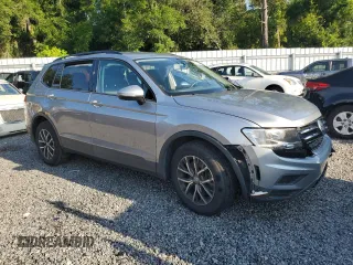 2021 Volkswagen Tiguan S with VIN 3VV1B7AX9MM023655, listed as a Copart auction lot 64159445 with 55,795 mi miles and Salvage title. Bid and sale history available at DreamBid. Image 4.