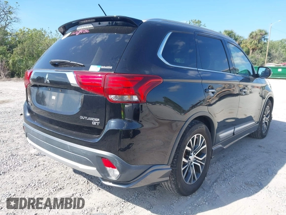 2016 Mitsubishi Outlander GT with VIN JA4JZ4AX0GZ017846, listed as a IAAI auction lot 41900962 with 117,604 mi miles and . Bid and sale history available at DreamBid. Image 4.
