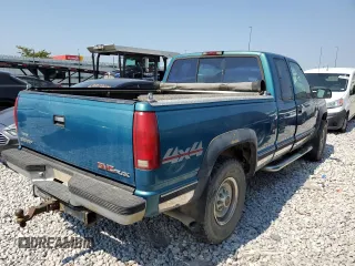 1997 GMC Sierra 2500 z VIN 1GTGK29JXVE562949, wystawiony jako Copart lot #68270174 z przebiegiem 212 422 mil mil oraz Szkody całkowita. Historia ofert i sprzedaży dostępna na DreamBid. Obrazek 3.