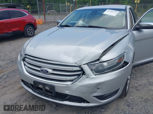 2015 Ford Taurus Limited with VIN 1FAHP2F89FG182598, listed as a IAAI auction lot 42222372 with 124,627 mi miles and . Bid and sale history available at DreamBid. Image 6.