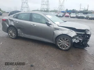2016 Kia Optima SXL Turbo z VIN 5XXGV4L24GG085759, wystawiony jako IAAI lot #42179979 z przebiegiem 105 318 mil mil oraz . Historia ofert i sprzedaży dostępna na DreamBid. Obrazek 1.