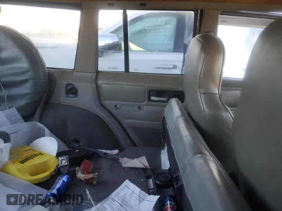 1996 Jeep Cherokee Sport with VIN 1J4FJ68S8TL244251, listed as a Copart auction lot 42321635 with 168,354 mi miles and Salvage Title. Bid and sale history available at carsss.com. Image 10.