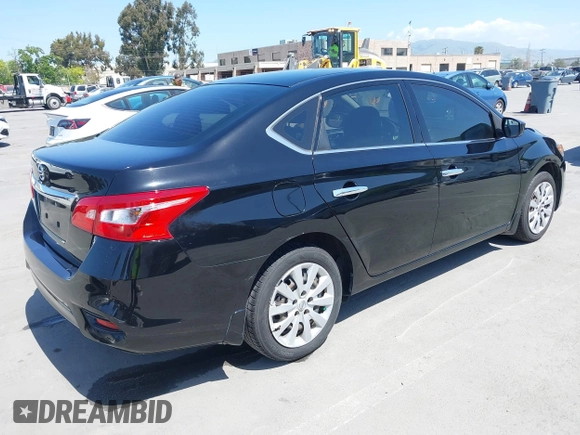 2018 Nissan Sentra S with VIN 3N1AB7AP7JY313463, listed as a IAAI auction lot 42178420 with 140,221 mi miles and . Bid and sale history available at DreamBid. Image 4.