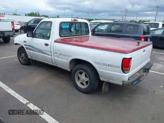 1995 Mazda B-Series Truck z VIN 4F4CR12A9STM30259, wystawiony jako IAAI lot #42243443 z przebiegiem 211 203 mil mil oraz . Historia ofert i sprzedaży dostępna na DreamBid. Obrazek 3.