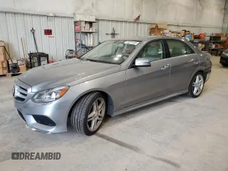 2014 Mercedes-Benz E 350 Luxury z VIN WDDHF8JBXEA799275, wystawiony jako Copart lot #59221435 z przebiegiem 106 745 mil mil oraz Czysty tytuł • Clean title. Historia ofert i sprzedaży dostępna na DreamBid. Obrazek 1.