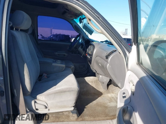 2000 Toyota Tundra SR5 with VIN 5TBRT3419YS114034, listed as a IAAI auction lot 41284071 with 200,797 mi miles and . Bid and sale history available at DreamBid. Image 5.