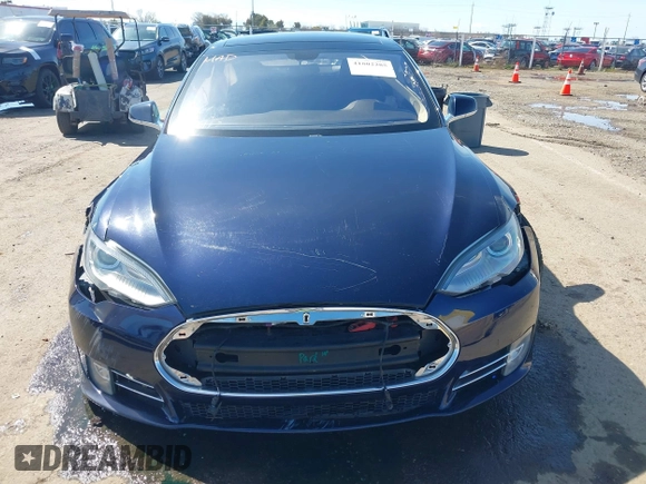 2014 Tesla Model S 60 with VIN 5YJSA1H11EFP47897, listed as a IAAI auction lot 41802285 with Not Provided miles and . Bid and sale history available at DreamBid. Image 13.