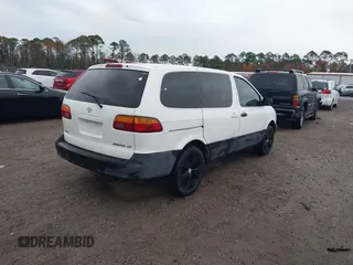 2000 Toyota Sienna CE z VIN 4T3ZF19C4YU209032, wystawiony jako IAAI lot #41067172 z przebiegiem 242 380 mil mil oraz . Historia ofert i sprzedaży dostępna na DreamBid. Obrazek 4.