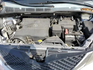 2013 Toyota Sienna SE с VIN 5TDXK3DC2DS383702, выставлен на аукционе Copart как лот 57618165 с пробегом 209 773 миль миль и Списание • Salvage title. История ставок и продаж доступна на DreamBid. Изображение 12.