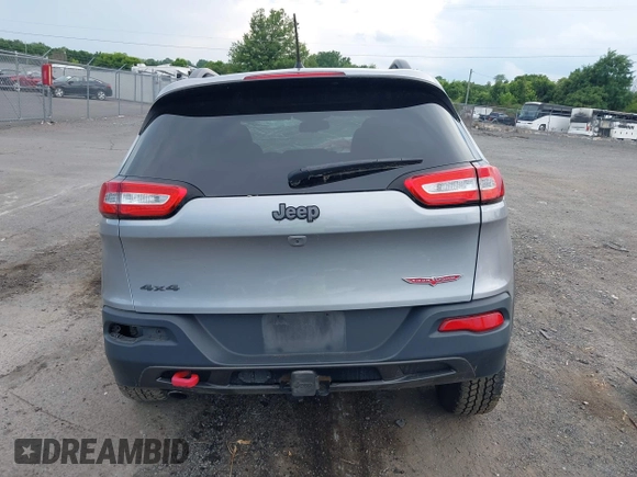 2017 Jeep Cherokee Trailhawk z VIN 1C4PJMBB8HW565462, wystawiony jako IAAI lot #42696507 z przebiegiem 114 819 mil mil oraz . Historia ofert i sprzedaży dostępna na DreamBid. Obrazek 16.