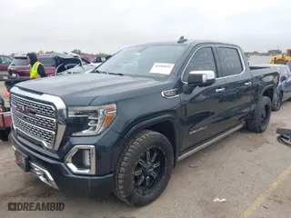 2020 GMC Sierra 1500 Denali with VIN 3GTU9FEL6LG360466, listed as a IAAI auction lot 41100892 with 84,881 mi miles. Bid and sale history available at carsss.com. Image 2.