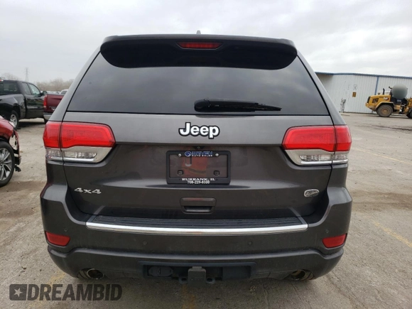 2014 Jeep Grand Cherokee Overland with VIN 1C4RJFCG8EC155109, listed as a Copart auction lot 52992825 with 128,604 mi miles and Clean Title. Bid and sale history available at carsss.com. Image 6.