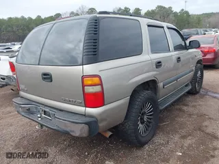 2003 Chevrolet Tahoe LS with VIN 1GNEC13V43R225216, listed as a IAAI auction lot 41535824 with 246,536 mi miles. Bid and sale history available at carsss.com. Image 4.