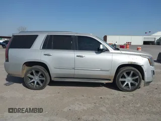 2016 Cadillac Escalade Luxury Collection z VIN 1GYS4BKJ7GR315425, wystawiony jako IAAI lot #41835277 z przebiegiem 176 753 mil mil oraz . Historia ofert i sprzedaży dostępna na DreamBid. Obrazek 13.