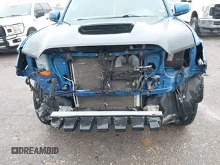 2016 Toyota Tacoma SR with VIN 5TFCZ5AN4GX013233, listed as a IAAI auction lot 41394610 with 142,099 mi miles and . Bid and sale history available at DreamBid. Image 6.