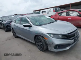 2019 Honda Civic Sport with VIN 19XFC2F8XKE012175, listed as a IAAI auction lot 42105978 with 75,050 mi miles and . Bid and sale history available at DreamBid. Image 1.