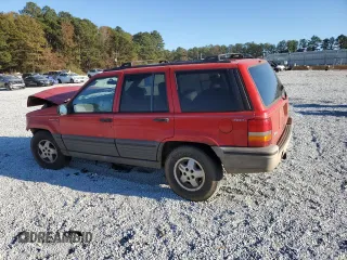 1995 Jeep Grand Cherokee Laredo with VIN 1J4GZ58S7SC747906, listed as a Copart auction lot 82529374 with 73,932 mi miles and Salvage Title. Bid and sale history available at carsss.com. Image 2.