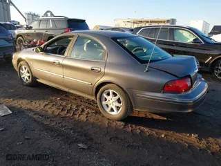 2003 Mercury Sable LS Premium with VIN 1MEFM55S03G606625, listed as a IAAI auction lot 41070883 with 100,002 mi miles. Bid and sale history available at carsss.com. Image 3.