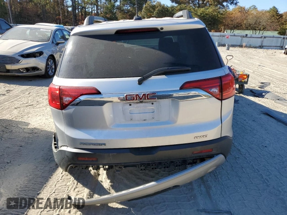 2018 GMC Acadia SLE with VIN 1GKKNSLA2JZ127389, listed as a Copart auction lot 77934854 with 85,542 mi miles and Salvage Title. Bid and sale history available at DreamBid. Image 6.