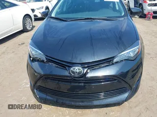 2018 Toyota Corolla L with VIN 2T1BURHE9JC964444, listed as a IAAI auction lot 42524046 with 69,218 mi miles and . Bid and sale history available at DreamBid. Image 18.