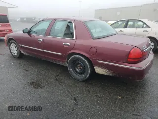 2005 Mercury Grand Marquis GS with VIN 2MEFM74W05X604628, listed as a Copart auction lot 51332335 with 165,224 mi miles and Salvage Title. Bid and sale history available at DreamBid. Image 2.