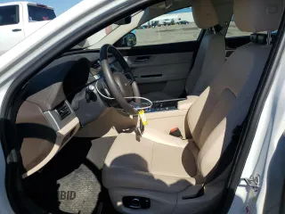 2020 Jaguar XF with VIN SAJBK4FX5LCY83189, listed as a Copart auction lot 47602005 with 10,708 mi miles and Salvage Title. Bid and sale history available at DreamBid. Image 7.