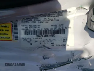 2015 Ford Fusion SE Hybrid z VIN 3FA6P0LU8FR105615, wystawiony jako Copart lot #61451155 z przebiegiem 106 778 mil mil oraz Szkoda całkowita • Salvage title. Historia ofert i sprzedaży dostępna na DreamBid. Obrazek 12.