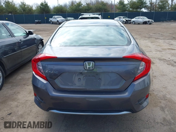 2019 Honda Civic LX with VIN 19XFC2F61KE037495, listed as a IAAI auction lot 41891007 with 90,262 mi miles and . Bid and sale history available at DreamBid. Image 16.