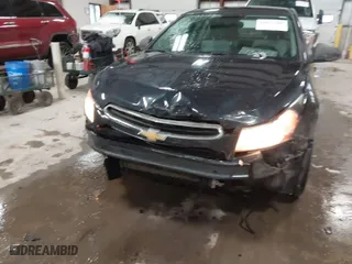 2016 Chevrolet Cruze Limited LS with VIN 1G1PC5SH5G7186165, listed as a IAAI auction lot 41071700 with 123,809 mi miles. Bid and sale history available at carsss.com. Image 6.