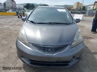 2013 Honda Fit with VIN JHMGE8H30DC056505, listed as a IAAI auction lot 42041626 with 219,454 mi miles. Bid and sale history available at carsss.com. Image 12.