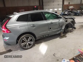 2020 Volvo XC60 Momentum with VIN YV4A22RK3L1416053, listed as a IAAI auction lot 41254175 with 52,653 mi miles and . Bid and sale history available at DreamBid. Image 4.