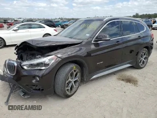 2017 BMW X1 xDrive28i with VIN WBXHT3C36H5F72244, listed as a Copart auction lot 49338815 with 79,351 mi miles and Salvage Title. Bid and sale history available at carsss.com. Image 1.
