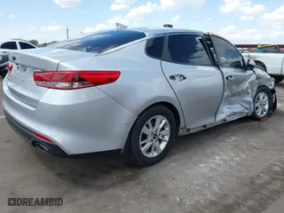 2016 Kia Optima LX with VIN KNAGT4L34G5111504, listed as a IAAI auction lot 41955031 with 80,727 mi miles. Bid and sale history available at carsss.com. Image 4.