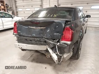 2015 Chrysler 300 with VIN 2C3CCAGG9FH864678, listed as a IAAI auction lot 41812118 with 107,873 mi miles. Bid and sale history available at carsss.com. Image 6.
