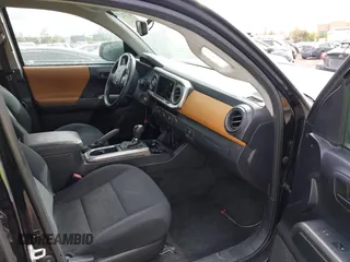 2017 Toyota Tacoma SR5 with VIN 5TFAZ5CN2HX040954, listed as a IAAI auction lot 41733137 with 97,780 mi miles and . Bid and sale history available at DreamBid. Image 5.