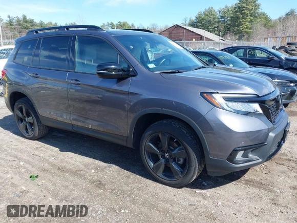 2021 Honda Passport Elite with VIN 5FNYF8H08MB011467, listed as a IAAI auction lot 41929708 with 34,106 mi miles. Bid and sale history available at carsss.com. Image 1.