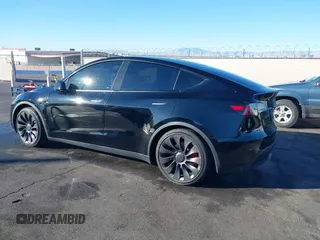 2023 Tesla Model Y Performance with VIN 7SAYGDEF6PF854797, listed as a IAAI auction lot 41319332 with 46,132 mi miles and . Bid and sale history available at DreamBid. Image 3.