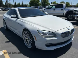 2012 BMW 6 Series 650i z VIN WBALX3C59CDV77637, wystawiony jako Copart lot #56733515 z przebiegiem 102 928 mil mil oraz Czysty tytuł • Clean title. Historia ofert i sprzedaży dostępna na DreamBid. Obrazek 1.