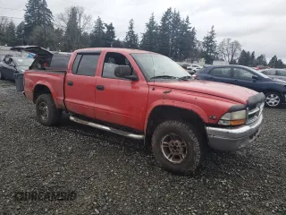 2000 Dodge Dakota Sport with VIN 1B7GG2AN8YS666541, listed as a Copart auction lot 86845794 with 232,639 mi miles and Salvage Title. Bid and sale history available at carsss.com. Image 4.