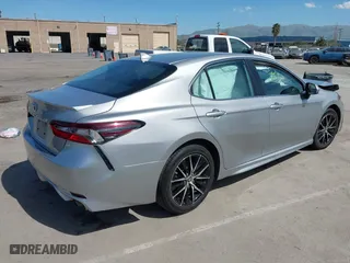 2021 Toyota Camry SE Nightshade with VIN 4T1G11AK2MU486841, listed as a IAAI auction lot 41888808 with 74,951 mi miles. Bid and sale history available at carsss.com. Image 4.