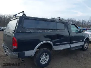 1998 Ford F-150 Standard with VIN 1FTZF18W0WNC16138, listed as a IAAI auction lot 41688951 with 354,669 mi miles. Bid and sale history available at carsss.com. Image 6.