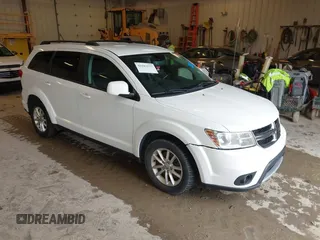 2014 Dodge Journey SXT z VIN 3C4PDDBG0ET309188, wystawiony jako IAAI lot #42183575 z przebiegiem 188 366 mil mil oraz . Historia ofert i sprzedaży dostępna na DreamBid. Obrazek 1.
