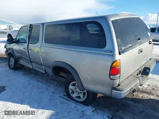 2002 Toyota Tundra SR5 with VIN 5TBBT44192S225410, listed as a IAAI auction lot 41402257 with 218,842 mi miles. Bid and sale history available at carsss.com. Image 3.