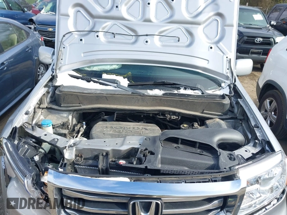 2014 Honda Pilot Touring with VIN 5FNYF4H9XEB038551, listed as a IAAI auction lot 41585720 with 150,725 mi miles and . Bid and sale history available at carsss.com. Image 10.