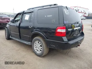 2014 Ford Expedition King Ranch with VIN 1FMJU1J59EEF05579, listed as a IAAI auction lot 41787316 with 129,675 mi miles and . Bid and sale history available at DreamBid. Image 3.